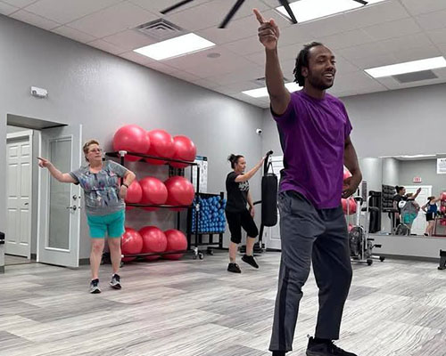 Man teaching dance class